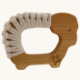 SENGER wooden yarn grasping sheep in oiled cherry wood and white yarn, on a cream background