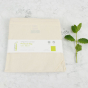 A Slice Of Green Organic Cotton Produce Bag - Extra Large, folded with cardboard packaging sleeve
