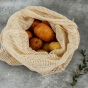 A Slice Of Green Organic Cotton Mesh Produce Bag - Extra Large containing potatoes