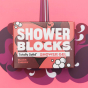 A Shower Blocks Black Cherry fragranced plastic free Gel Bar in it's box pictured on a pink and purple coloured patterned background 