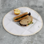 A Slice of Green plastic-free food wrap unfolded on a grey background with a sandwich and apple in the middle