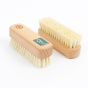 A Slice of Green plastic-free plant based nail scrubbing brushes on a white background