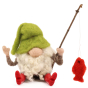A closer view of the details on The Makerss Needle Felt Fishing Gnome. A beautifully crafted fishing gnome with a green hat, white bushy beard, little red wellington boots, a small fishing stick and a small red fish, sat on a white background