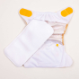 Tots Bots newborn nappy pad shown next to a bamboozle nappy wrap
