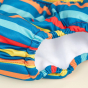 close up of the colourful striped totsbots swimming pants