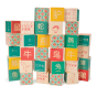 Uncle Goose eco-friendly Chinese language toy blocks stacked in a pile on a white background