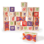 Uncle Goose plastic free Hindi language toy blocks stacked in a pile on a white background