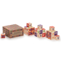 Uncle Goose eco-friendly Hindi letter blocks stacked in 3 piles on a white background next to their cardboard box