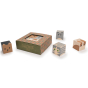 Uncle Goose handmade wooden pet cubeling blocks scattered on a white background next to their cardboard box