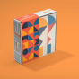 Box of Uncle Goose children's Waldorf mod pattern toy blocks on an orange background