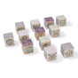 12 Uncle Goose plastic-free carved zodiac toy blocks laid out on a white background