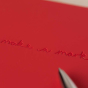 make a mark embossed on the front cover of a A5 VENT for change recycled leather notebook