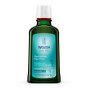 Weleda Revitalising Hair Tonic, a proven natural treatment for thinning, brittle hair, hair loss, dandruff and scalp dryness. In a green glass bottle with blue label. 