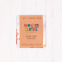 Wonder cloths world map learning cloth wrapped up in its paper packaging on a white background