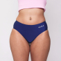 Picture of the WUKA Teen Stretch Seamless Period Pants in blue, worn by a model.