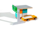 Candylab small world toll booth set on a white background next to a yellow wooden car toy