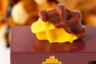 Close up of the miniature waffle on top of the Candylab handmade wooden waffle truck toy