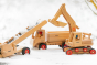 Fagus handmade wooden vehicle toys in a snow scene