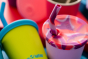 Close up of the Klean Kanteen removable kid cup straw lids in the pink tie dye colour