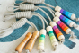 Mader eco-friendly linen skipping ropes laid out on a blue and white carpet