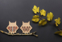 Two Moon Picnic plastic free wooden cross stitch owls on a small branch on a dark grey background