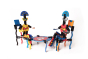 Naef Art model kit made into two people sat at a table and chair on a white background