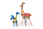 Naef sustainable cardboard Art Uris model kit built into two birds on a white background