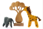 Papoose childrens handmade felt elephant and giraffe toys on a white background next to a Papoose wooden African tree