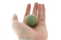 Close up of a Papoose soft felt earth ball toy on the palm of a hand on a white background