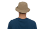 Man stood backwards on a white background wearing the Patagonia eco-friendly khaki bucket hat