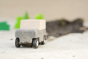 Close up of Plan Toys Wagon leaving a pile of mud