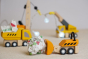 Plan Toys PlanWorld Construction Vehicles Set - This construction vehicle set for children includes a crane, forklift truck and dumper truck, made from solid sustainable rubber wood and brightly painted in orange and black.