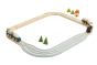 PlanToys wooden and rubber road and rail toy set, laid out on a white background in a small train scene showing how the adapter pieces connect the sets