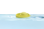 Close up of a PlanToys plastic-free natural rubber boat toy floating in some water