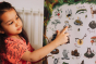 A child pointing The Phive Enchanting Woodland Alphabet Print