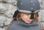Child wearing the Vah Black Alamann Knight Helmet