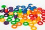 Grapat Nin Rings & Coins Wooden Toy Set. 6 rainbow coloured peg doll Nins, 36 rings and 18 coins for colour matching and sorting. Mixed colours on a white background.
