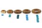 Papoose motessori wooden rings lined up in order of size next to some Grapat counters for number play