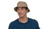 Man stood on a white background wearing the Patagonia eco-friendly wavefarer bucket hat 