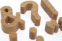 Close up of the Reel Wood plastic-free punctuation blocks set laid out on a white background