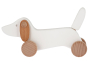 Bajo wooden dachshund puppy toy dog on a white background