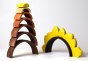 Bumbu solid wooden stacking sunflower arches stacked in a tower on a white background