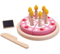 The PlanToys wooden birthday cake includes 6 slices of double sided cake, 6 removable candles, knife, plate and mini chalk board. White background.