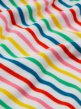 Close up of the Frugi rainbow stripe organic cotton baby body suit 