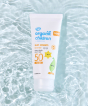 The Green People Organic Lavender Children Sun Cream SPF50 100ml, in a pool of water