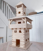 A carefully crafted WALACHIA Tower. The wooden blocks showing their natural grain sit perfectly after being glued together, creating a fantastically large Tower