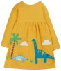 yellow dolcie dress with white dots and dinosaurs applique from frugi