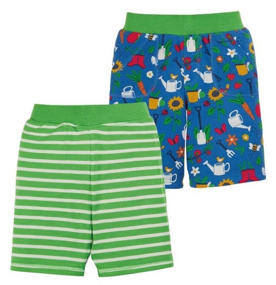 organic cotton reversible shorts with colourful garden print on blue on one side and green and white stripes on reverse from frugi