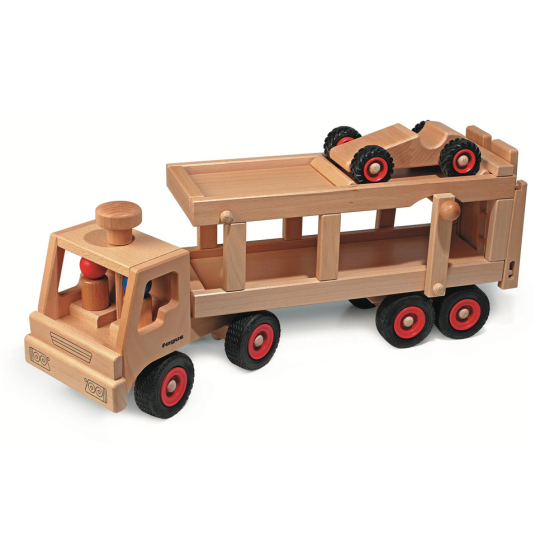 Fagus handmade wooden car transporter lorry toy with its ramp raised on a white background