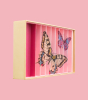Side view of the Billes & Co Butterfly Anamorphic Glass Marble Box, showing two butterflies